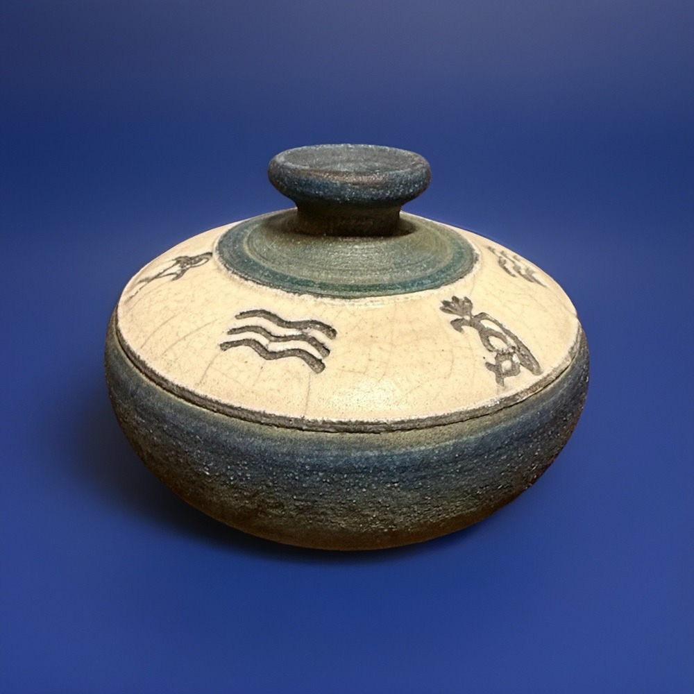 Signed Ben Diller Raku pottery vase with iridescent glaze.